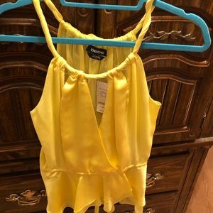 Brand new blouse by Bebe with tags